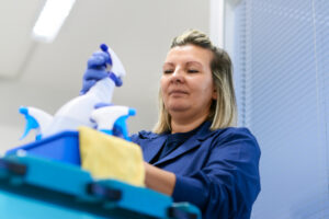 Woman Working As Professional Cleaner In Office
